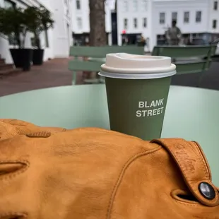 a cup of coffee on a table