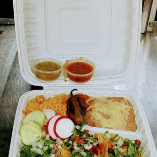 a meal in a styrofoam container