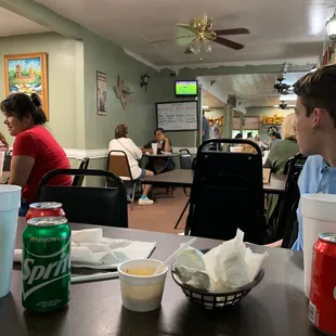 a man and a woman sitting at a table