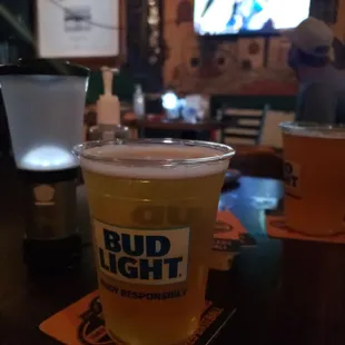 a beer in a plastic cup