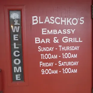 Hours of operation, front entry door.