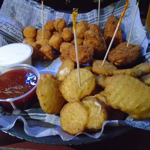 Fried pickles, jalapeno poppers, and fried pepper jack cheese balls with 2 dipping sauces.
