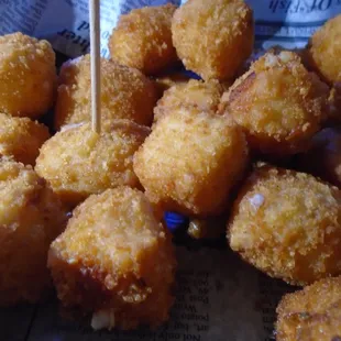 Fried pepper jack cheese balls, close-up.