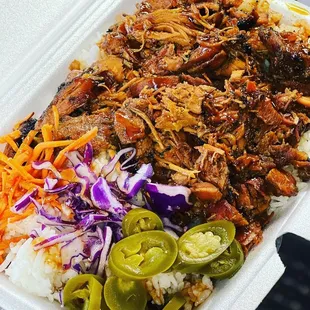 a meal in a styrofoam container