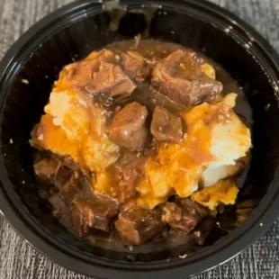 Southern Comfort... Yummy cornbread topped with homemade mashed potatoes and slow cooked beef and gravy