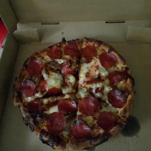 Small pizza with pepperoni, double sausage, we&apos;ll done.