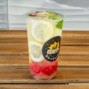 a cold drink in a plastic cup