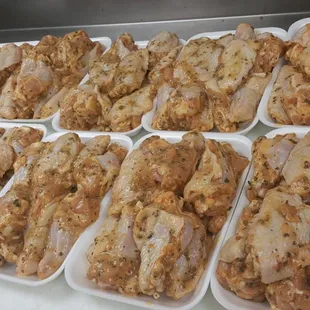 Garlic Parmesan Chicken Wings. Marinated in house. Delicious