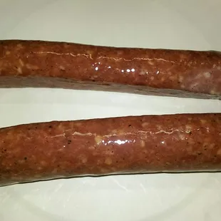 The hot dogs up close which is more like a tasty sausage, better than any commercial hot dog.
