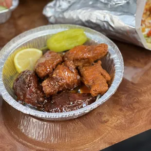 hicken wings in a foil container