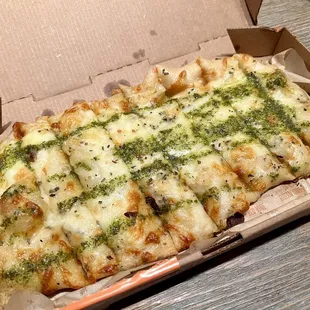Pesto garlic cheesy bread.