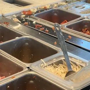 Dirty pizza prep stations...