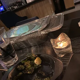 They ran out of to-go boxes so they brought foil pans...