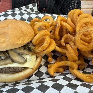 Mushroom Swiss burger and curly fries