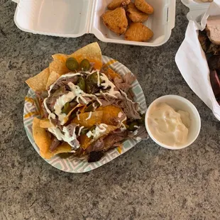 These are their nachos, fried Mac and cheese, and mash potatoes and gravy