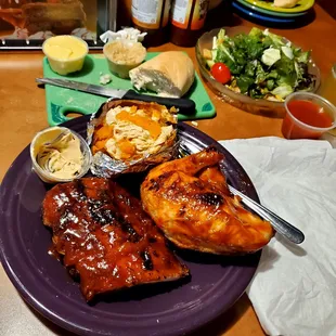 Chicken, ribs, sweet potato, salad.  Delicious!