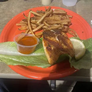Salmon with Fresh cut fries. My other side was a fresh Caesar salad.