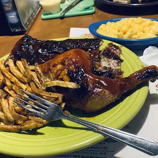 Ribs and half chicken Cajun fries and Mac &amp; cheese