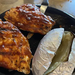 BBQ (hot) chicken breasts with baked potato