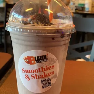 a smoothie in a plastic cup