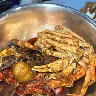 Mussels, clams, head on Shrimp, Snow Crabs, crawfish, potatoes and corn!