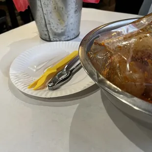 Super expensive place with paper plates and plastic forks