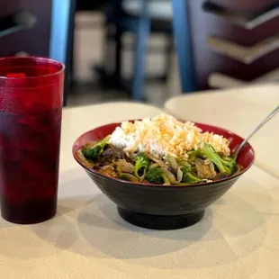  bowl of food and a drink