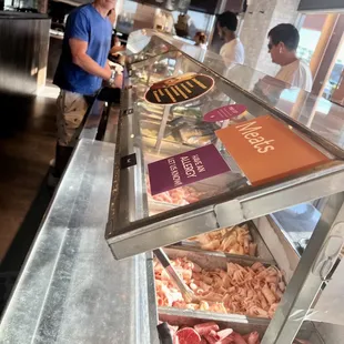 Tons of choices of food to put in your bowl before it is cooked. Ice cream for dessert.