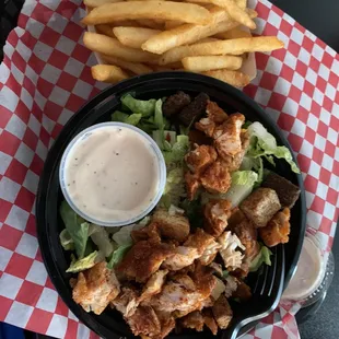 Caesar salad with fries