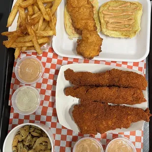 a tray of fried fish and fries