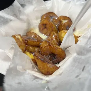 Fried bananas with condensed milk, there were a couple that are missing from the tray already when I took this.  Soooo good!