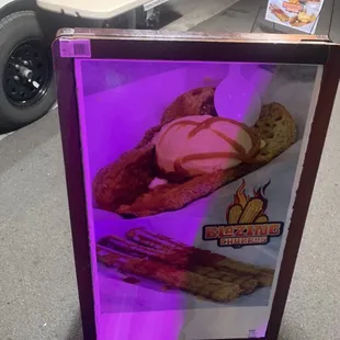 a hot dog with ice cream and bacon