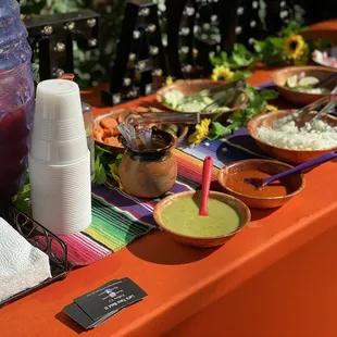 Table with salsa bar. Jamaica.