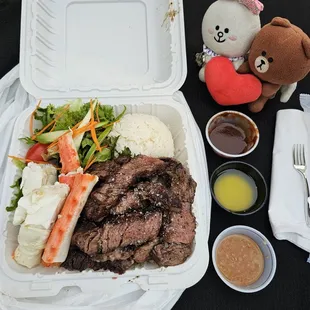 Crab and Steak plate with sauces of your choice and melted butter