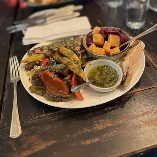 Vegetable plate with chicken and grains, and beets side dish