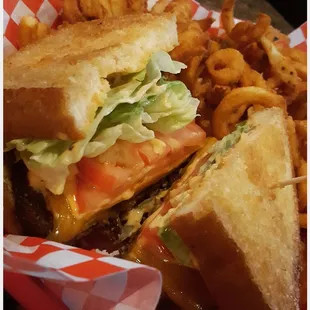 Frisco burger with side of curly fries