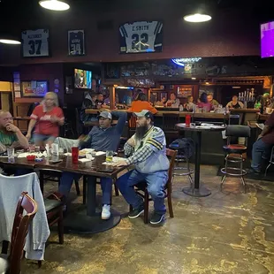 a group of people sitting at a table