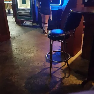 Still waiting for a drink. Bartender. Is clearly busy