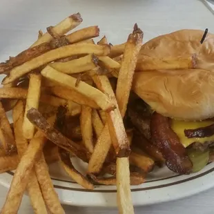 The biggest bacon cheeseburger and fries I&apos;ve ever seen.