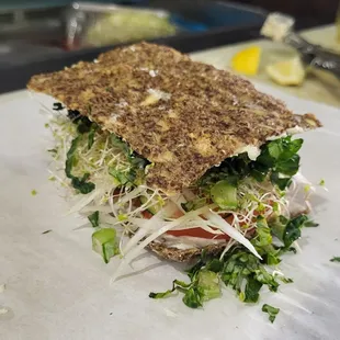 a sandwich on a cutting board