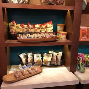 a shelf of snacks and snacks