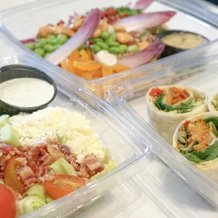 a variety of food in plastic containers