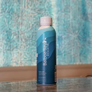 a bottle of hair color sitting on a table