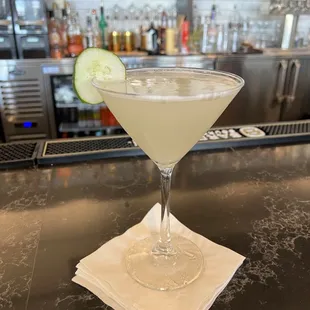 a cocktail in a martini glass