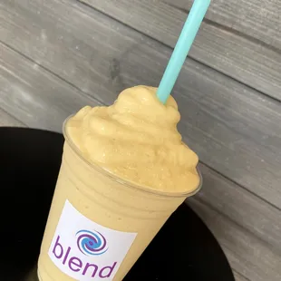 a smoothie in a plastic cup