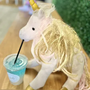 Unicorn~ My daughter LOVES unicorns &amp; brought her unicorn just for the occasion to drink this cotton candy drink, he he!