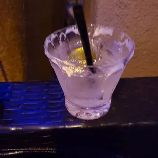 a drink in a glass with a straw