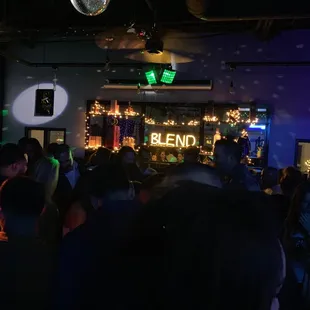 a crowd of people at a party