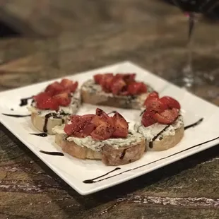 Come try our spinach artichoke crostini.