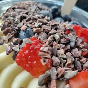 a bowl of fruit and chocolate chips
